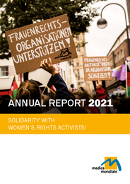 Cover of the annual report 2021 of the women's rights organisation medica mondiale with a protest demonstration by women. 