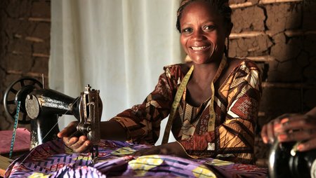 A women with a sewing machine in Kongo.