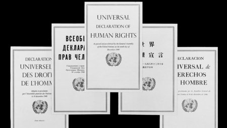 The first page of the Universal Declaration of Human Rights in five different languages.