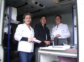 Monika Hauser and two gynaecologists in the mobile ambulance.