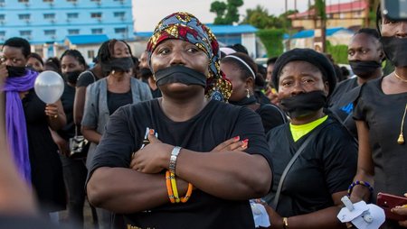 Women demonstrating in Liberia at the Thursdays in Black street protests.
